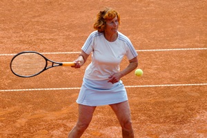 middle-aged-woman-playing-tennis-200-300